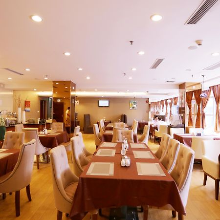 Yihe Hotel Ouzhuang Canton Esterno foto