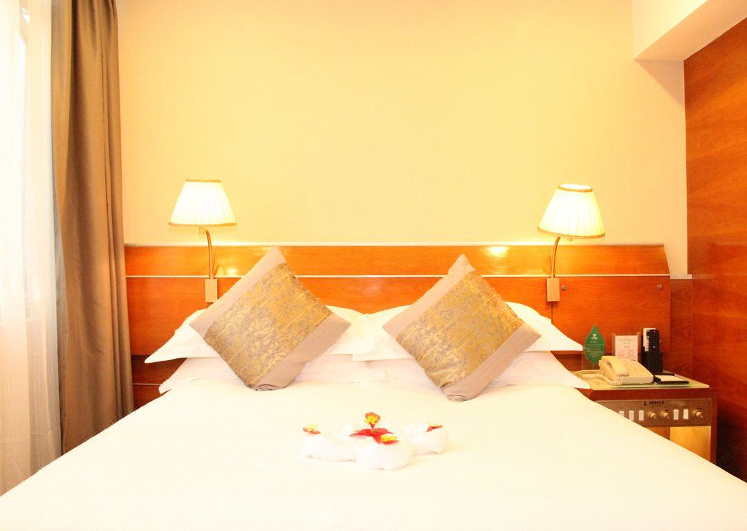 Yihe Hotel Ouzhuang Canton Esterno foto