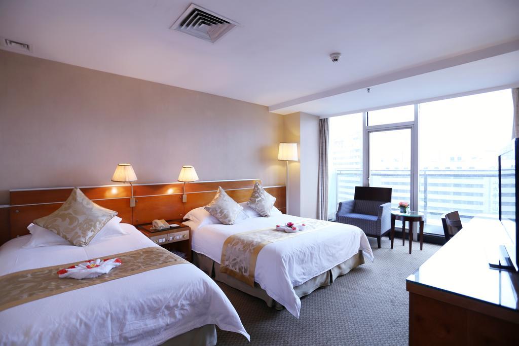Yihe Hotel Ouzhuang Canton Esterno foto
