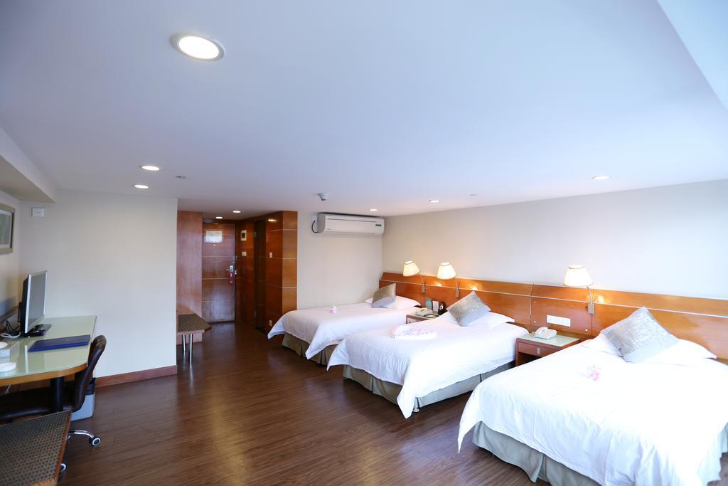 Yihe Hotel Ouzhuang Canton Esterno foto