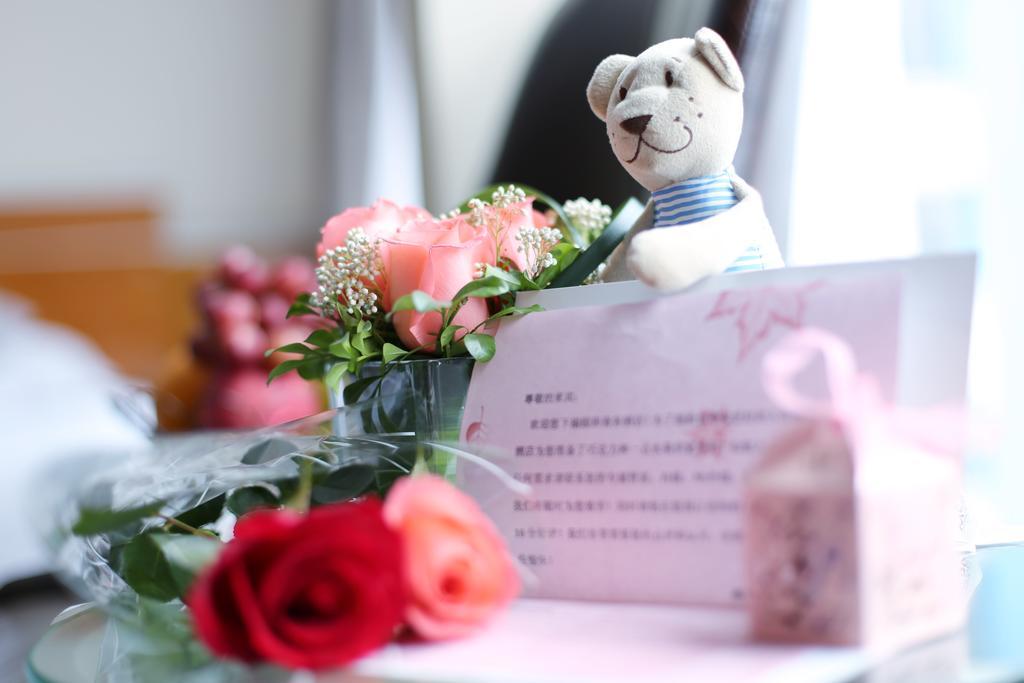 Yihe Hotel Ouzhuang Canton Esterno foto