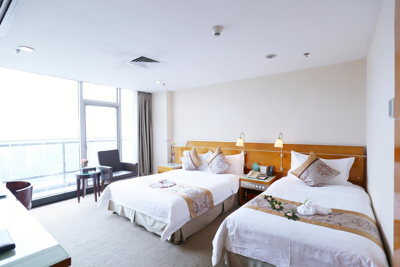 Yihe Hotel Ouzhuang Canton Camera foto