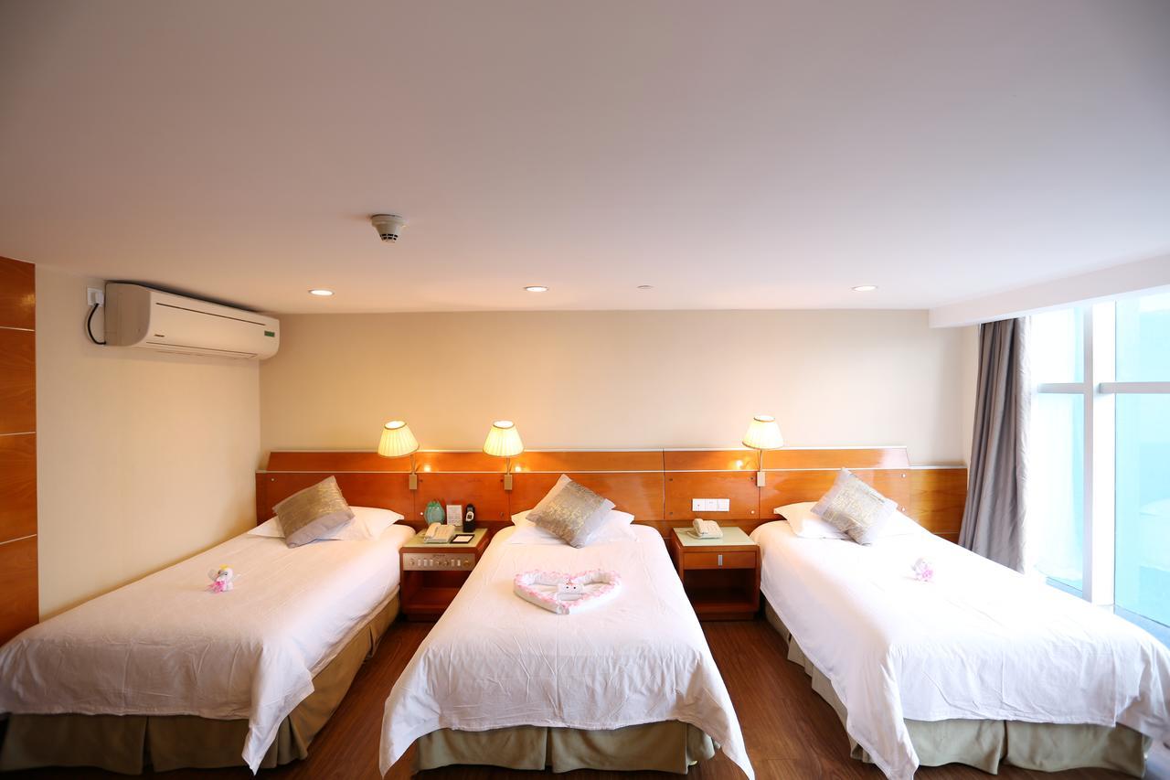 Yihe Hotel Ouzhuang Canton Camera foto